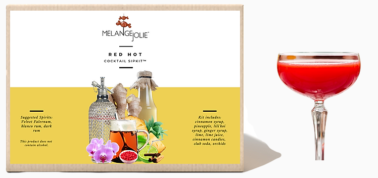 Mélange Jolie Red Hot Cocktail SipKit™ featuring vibrant ingredients and elegant coupe glass, perfect for cocktail enthusiasts.